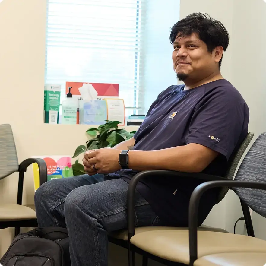 Patient in the waiting room of an onsite health center.
