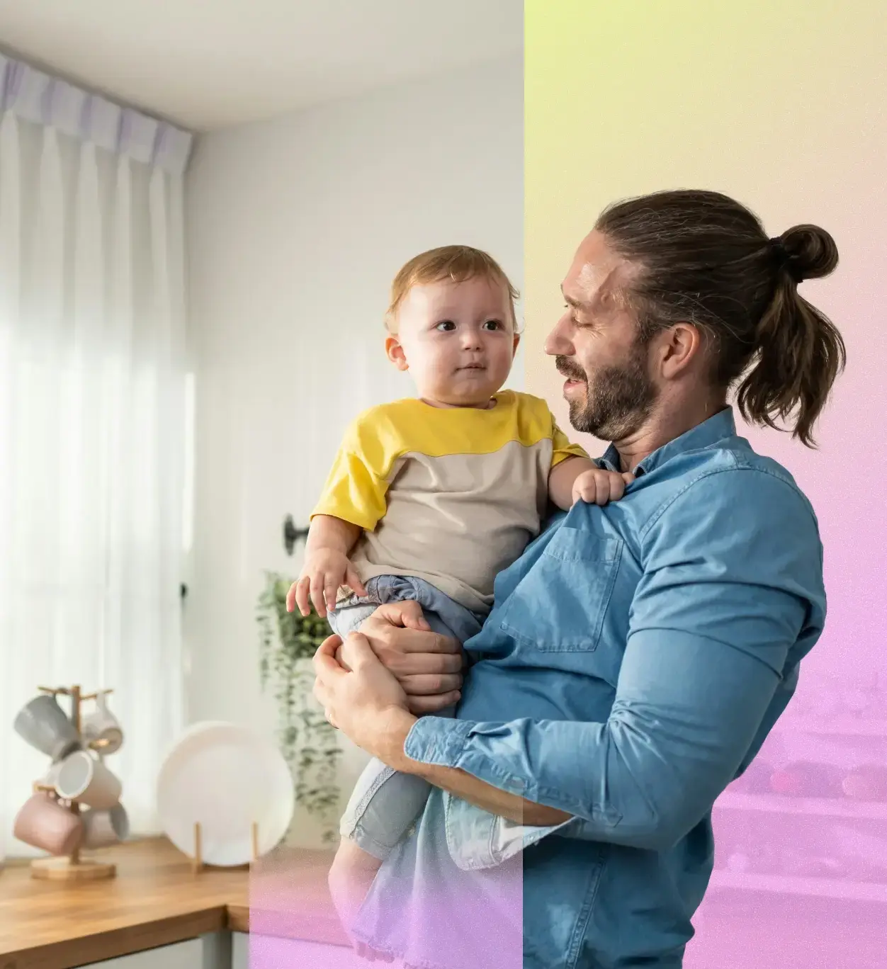 Father holding a child.