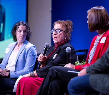 Three women—Amy Davis, Bernice Pescosolido, and Christan Royer—share strategic insights on whole health during a collaborative panel discussion in Indiana.