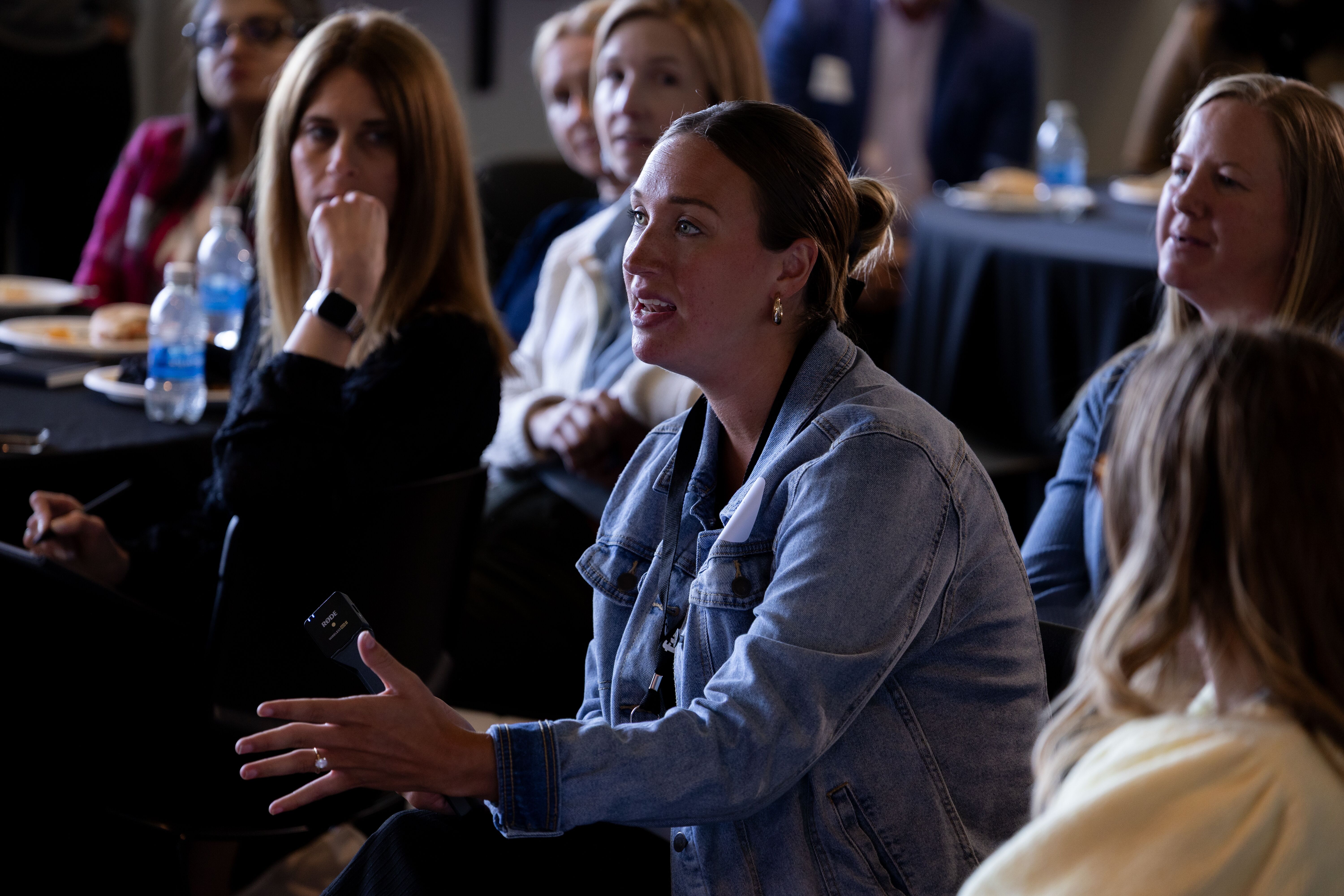 Attendee asks a question during the Marathon Health workforce health conversation.