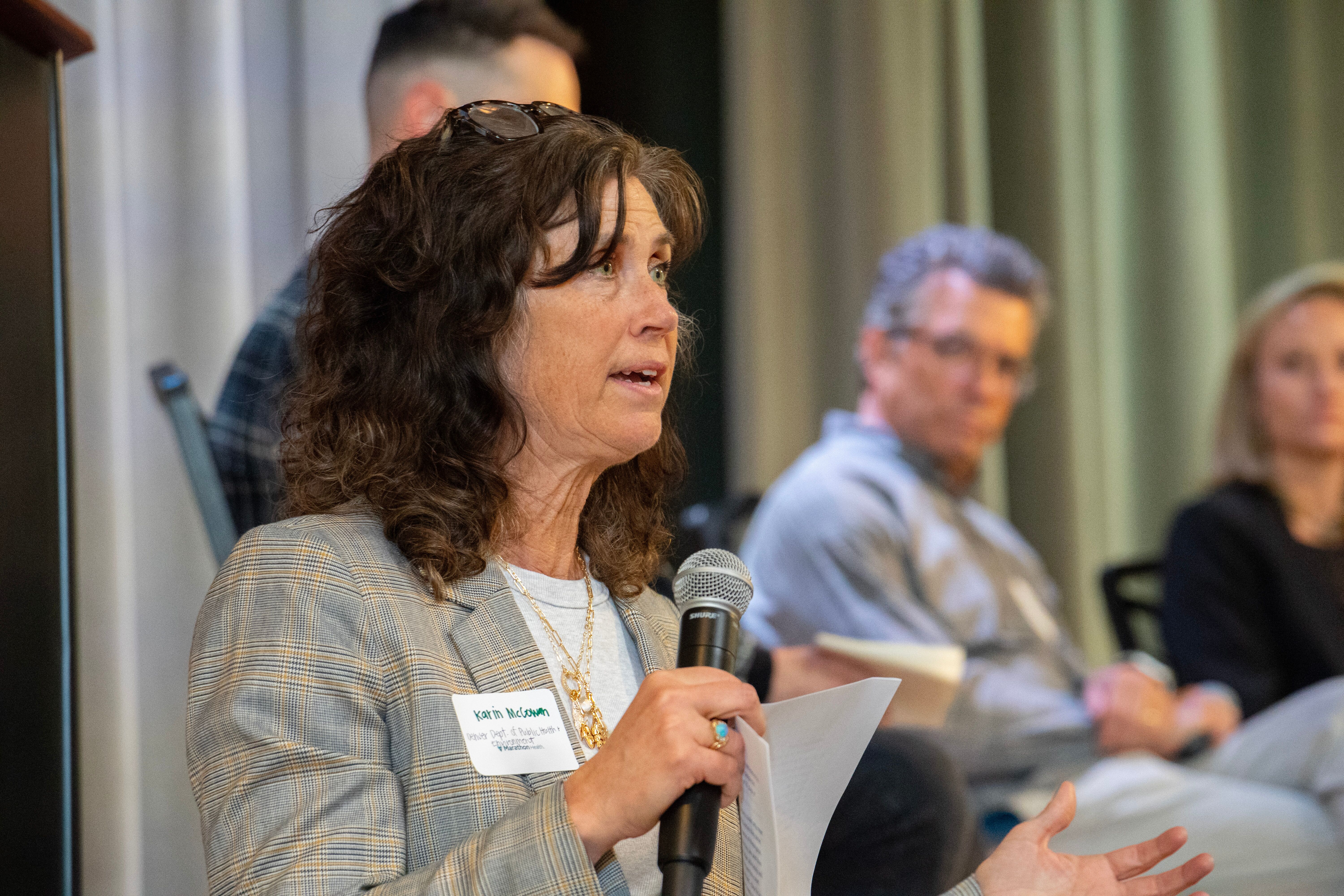Karin McGowan speaks at the Marathon Health Colorado roundtable on mental health.