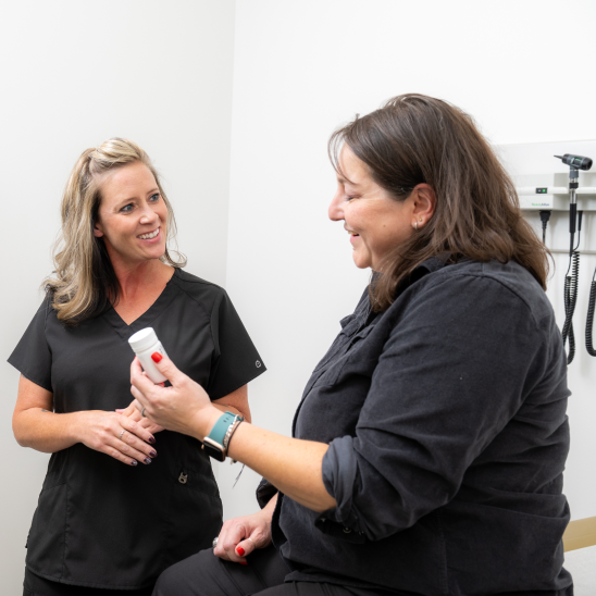 Healthcare provider discussing treatment options with a patient during a consultation.