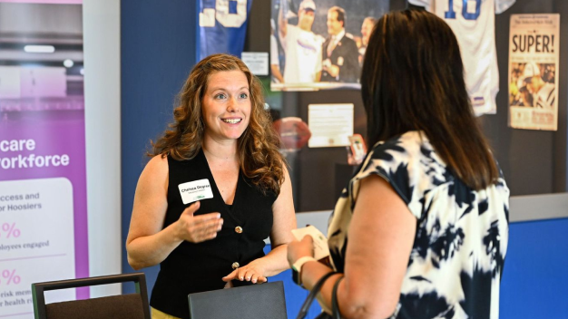 Attendees check in at the Marathon Health Indiana Roundtable.