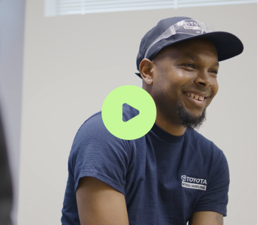 A smiling Toyota employee, Marathon Health brand anthem video.
