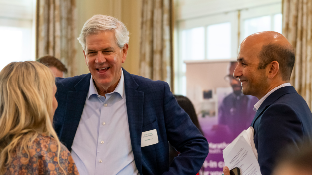 Attendees network at the Marathon Health Charlotte roundtable.