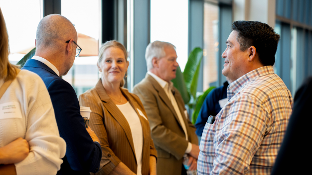 Attendees network at the Marathon Health Ohio roundtable.