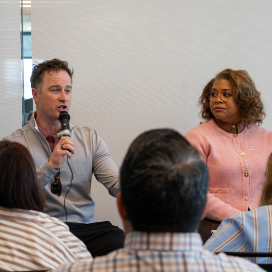 Jamey Houle and Erika Clark Jones on the panel at the Ohio mental health roundtable.