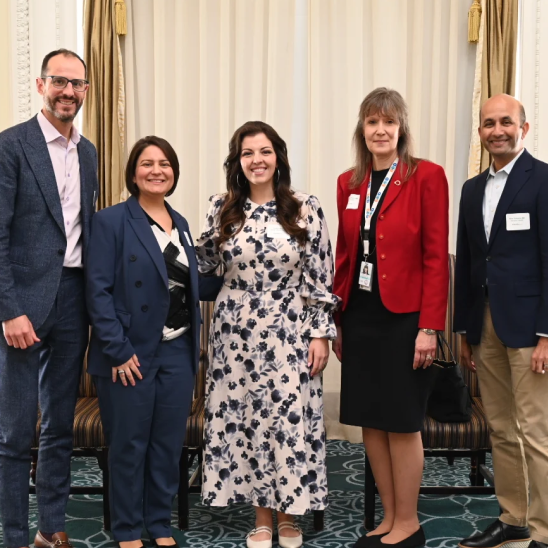 Speakers at the Virginia workforce health roundtable posing together.